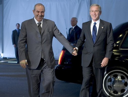 President George W. Bush and Iraqi interim Prime Minister Ayad Allawi arrive at the United Nations Headquarters in New York City Tuesday, Sept. 21, 2004. White House photo by Paul Morse.