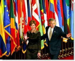 President George W. Bush and Laura Bush wave to their guests at the United States Reception at the Waldorf Astoria Hotel in New York City, Tuesday, Sept. 22, 2002.  White House photo by Tina Hager