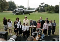 President George W. Bush thanks U.S. school children and the International Federation of Red Cross and Red Crescent Societies for their efforts to aid the victims of the school siege in Beslan, Russia, during a statement to the press on the South Lawn Friday, Sept. 24, 2004.  White House photo by Paul Morse