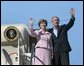 President George W. Bush and Mrs. Bush arrive aboard Air Force One at Reno/Tahoe International Airport, Thursday, Oct. 14, 2004. White House photo by Eric Draper