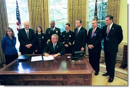 President George W. Bush signs HR 5467, The Department of Homeland Security Appropriations Act for the Fiscal Year 2005, in the Oval Office Monday, Oct. 18, 2004.  White House photo by Tina Hager