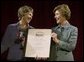 Laura Bush congratulates Kathleen Kean, the national Preserve America History Teacher of the Year, during an awards program at the New York Historical Society in New York, N.Y., Tuesday, Oct. 19, 2004. White House photo by Joyce Naltchayan.