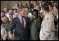 After delivering his remarks, President Bush greets military personnel at MacDill Air Force Base in Tampa, Fla., June 16, 2004. White House photo by Eric Draper.