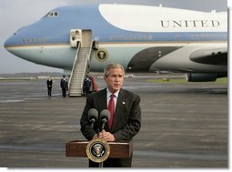 President George W. Bush delivers a statement to the media in front of Air Force One at Toledo, Ohio Express Airport, Friday, Oct. 29, 2004.  White House photo by Eric Draper