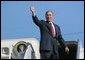 President George W. Bush gives a thumbs up to a crowd of well wishers gathered to see his departure aboard Air Force One at Waco's TSTC Airport in Waco, Texas. File Photo.