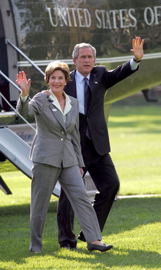 President George W. Bush and Laura Bush wave to White House staff upon arrival from Texas Tuesday, Nov. 2, 2004. White House photo by Susan Sterner