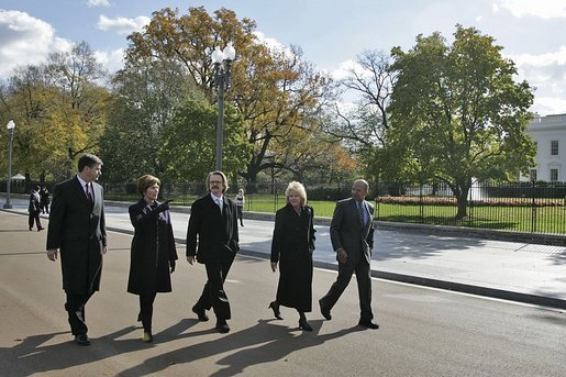 After speaking at the ceremonies in which Pennsylvania Avenue was opened as a pedestrian park, Laura Bush walks with, from left, Chairman of the National Capital Planning Commission John Cogbill; landscape architect Michael Van Valkenburgh; Federal Highway Administration Administrator Mary Peters; and Washington, D.C., Mayor Anthony Williams along Pennsylvania Avenue Tuesday, Nov. 9, 2004. White House photo by Susan Sterner.