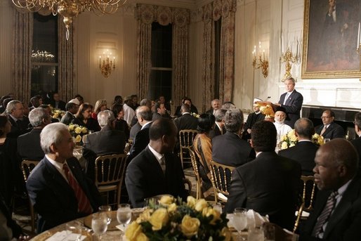 President George W. Bush addresses the Iftaar Dinner with Ambassadors and Muslim Leaders in the State Dining Room of the White House, Nov. 10, 2004. White House photo by Paul Morse