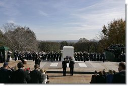 President George W. Bush visit the Tomb of the Unknowns at Arlington National Cemetery on Veterans Day Thursday, Nov. 11, 2004. After paying his respects, the President delivered remarks at the cemetery's amphitheater. White House photo by Paul Morse
