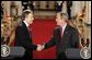 President George W. Bush and British Prime Minister Tony Blair shake hands after their press conference in the East Room of the White House on Friday November 12, 2004. White House photo by Paul Morse.