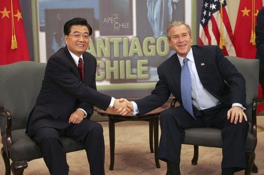 President George W. Bush and President Jintao Hu of China meet while attending an APEC summit in Santiago, Chile, Nov. 20, 2004. White House photo by Eric Draper.