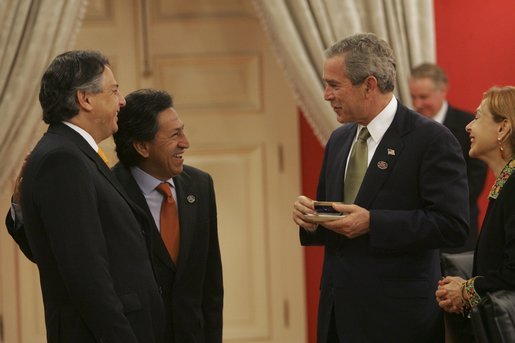 President George W. Bush meets with President Alejandro Toledo of Peru, Manuel Rodriguez Cuadros, Foreign Minister of Peru, far left, and President Toledo's wife, Ms. Elaine Karp, during the APEC Summit at La Moneda Presidential Palace in Santiago, Chile, Sunday, Nov. 21, 2004. White House photo by Eric Draper