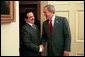 President George W. Bush welcomes His Majesty King Hamad bin Issa Al Khalifa of Bahrain to the Oval Office Monday, Nov. 29, 2004. White House photo by Paul Morse