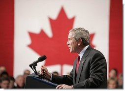President George W. Bush delivers a speech at Pier 21, Canada's celebrated point of immigration and military deployment, in Halifax, Canada, Dec. 1, 2004. "I'm proud to stand in this historic place, which has welcomed home so many Canadians who defended liberty overseas, and which so many new Canadians began their North American dream," said the President. White House photo by Paul Morse
