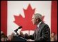 President George W. Bush delivers a speech at Pier 21, Canada's celebrated point of immigration and military deployment, in Halifax, Canada, Dec. 1, 2004. "I'm proud to stand in this historic place, which has welcomed home so many Canadians who defended liberty overseas, and which so many new Canadians began their North American dream," said the President.White House photo by Paul Morse