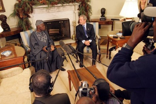 President George W. Bush meets with Nigerian President Olusegun Obasanjo in the Oval Office Thursday, Dec. 02, 2004. "I think it is vital that the continent of Africa be a place of freedom and democracy and prosperity and hope, where people can grow up and realize their dreams," President Bush said after the meeting. "It's a continent that has got vast potential, and the United States wants to help the people of Africa realize that potential." White House photo by Tina Hager.
