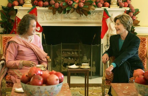 Laura Bush talks with Sehba Musharraf, wife of Pakistan President Pervez Musharraf, during a coffee at the White House Saturday, Dec. 4, 2004.White House photo by Susan Sterner