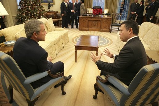 President George W. Bush meets with his Majesty King Abdullah of the Hashemite Kingdom of Jordan in the Oval Office, Monday, Dec. 6, 2004. White House photo by Eric Draper