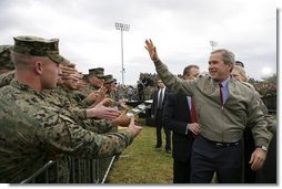President George W. Bush greets military personnel and their families after delivering remarks at Marine Corps Base Camp Pendleton, Calif., Tuesday, Dec. 7, 2004. White House photo by Eric Draper