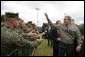 President George W. Bush greets military personnel and their families after delivering remarks at Marine Corps Base Camp Pendleton, Calif., Tuesday, Dec. 7, 2004.White House photo by Eric Draper