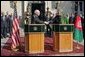 Vice President Dick Cheney and Afghanistan President Hamid Karzai shake hands during a press availability at the Presidential Palace in Kabul, Afghanistan, Dec. 7, 2004. White House photo by David Bohrer
