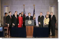 President George W. Bush speaks during the signing ceremony of S. 2845, The Intelligence Reform and Terrorism Prevention Act of 2004, in Washington, D.C., Dec. 17, 2004. "Under this new law, our vast intelligence enterprise will become more unified, coordinated and effective. It will enable us to better do our duty, which is to protect the American people," said the President.  White House photo by Paul Morse