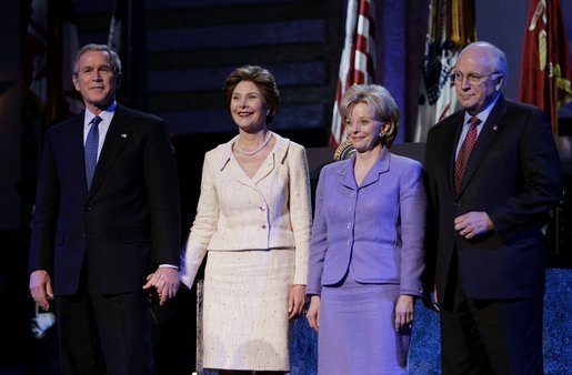 President George W. Bush stands with Laura Bush, Lynne Cheney and Vice President Dick Cheney during the pre-inaugural event “Saluting Those Who Serve” at the MCI Center in Washington, D.C., Tuesday Jan. 18, 2005. White House photo by Eric Draper