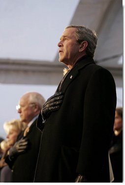 President George W. Bush and Vice President Dick Cheney watch the inaugural concert 'A Celebration of Freedom' on the Ellipse south of the White House, Wednesday, Jan. 19, 2005. "An inauguration is a time of unity for our country," President Bush said during remarks delivered at the event. "With the campaign behind us, Americans lift up our sights to the years ahead and to the great goals we will achieve for our country. I am eager and ready for the work ahead."  White House photo by Eric Draper