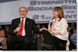 President George W. Bush and librarian Amy Borger talk about the strengthening of Social Security during a Town Hall meeting at the Montana ExpoPark in Great Falls, Mont., Thursday, Feb. 3, 2005.  White House photo by Eric Draper