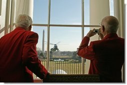 Members of the famed Tuskegee Airmen watch as President Bush returns to the White House aboard Marine One Tuesday, Feb. 8, 2005. The Airmen were at the White House to attend a ceremony honoring February as African American History Month.   White House photo by Susan Sterner