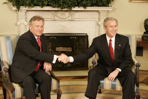 President George W. Bush welcomes Poland's President Aleksander Kwasniewski to the Oval Office Wednesday, Feb. 9, 2005. During their visit, President Kwasniewski spoke about the optimism of his government regarding the future of Iraq. White House photo by Eric Draper
