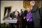 President George W. Bush signs S. 5, the Class Action Fairness Act of 2005, during a ceremony in the East Room, Friday, Feb. 18, 2005. White House photo by Eric Draper