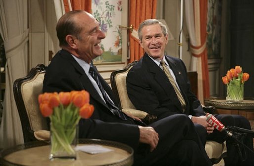 Attending the NATO Summit, President George W. Bush meets with French President Jacques Chirac in Brussels, Belgium, Monday, Feb. 21, 2005. White House photo by Eric Draper.