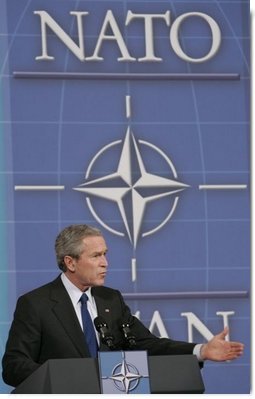 President George W. Bush speaks during a joint news conference with NATO Secretary General Jaap de Hoop Scheffer at NATO Headquarters in Brussels, Tuesday, Feb. 22, 2005.  White House photo by Paul Morse