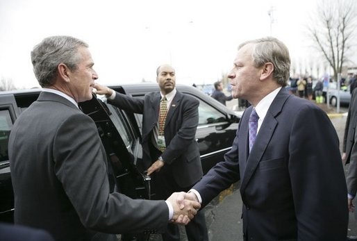 President George W. Bush shakes hands with Secretary General Jaap de Hoop Scheffer as he departs NATO headquarters in Brussels Tuesday, Feb. 22, 2005, at the conclusion of the NATO Summit. White House photo by Eric Draper