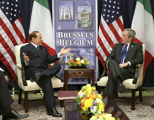 President George W. Bush meets with Prime Minister Silvio Berlusconi of Italy at NATO Headquarters in Brussels Tuesday, Feb. 22, 2005. White House photo by Eric Draper