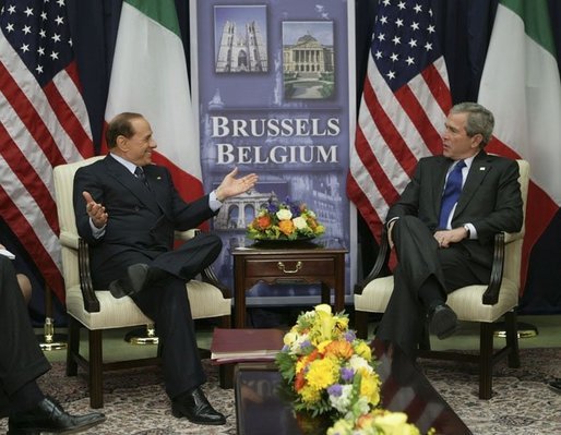 President George W. Bush meets with Italian Prime Minister Silvio Berlusconi Tuesday, Feb. 22, 2005, at NATO Headquarters in Brussels. White House photo by Eric Draper White House photo by Eric Draper.