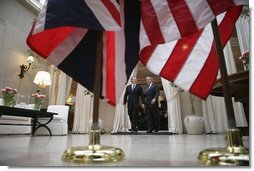 President George W. Bush and Prime Minister Tony Blair of the United Kingdom walk together after addressing the press at the Ambassador's Residence in Brussels, Belgium, Tuesday Feb. 22, 2005.  