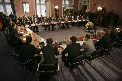 President George W. Bush participates in a Wednesday, Feb. 23, 2005, roundtable discussion with young professionals at the Electoral Palace in Mainz, Germany. White House photo by Eric Draper