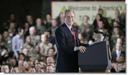 President Bush smiles broadly while addressing troops Wednesday, Feb. 24, 2005, at Wiesbaden Army Air Field in Wiesbaden, Germany.   White House photo by Paul Morse