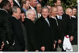 President George W. Bush poses with the Boston Red Sox, the 2004 World Series champions, during a South Lawn ceremony celebrating the team’s historic achievement Wednesday, March 02, 2005. “You answered 86 years of prayer,” said the President. “That's an amazing feat, isn't it? I mean, when the Red Sox won, people all over the world cheered.”  White House photo by Eric Draper