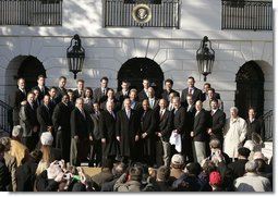 President George W. Bush hosts a visit by the Boston Red Sox, the 2004 World Series champions, Wednesday, March 02, 2005. “You know, the last time the Red Sox were here, Woodrow Wilson lived here. There were only 16 teams in baseball then. After the World Series victory in 1918, a reporter from Boston said, 