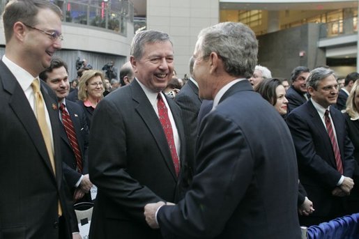 President George W. Bush greets former Attorney General John Ashcroft after the swearing-in ceremony Thursday, March 3, 2005, of Michael Chertoff as new Homeland Security chief. The event took place at the Ronald Reagan Building and International Trade Center in Washington, D.C. White House photo by Paul Morse