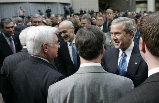 President George W. Bush and Secretary of Homeland Security Michael Chertoff greet the crowd at the Ronald Reagan Building and International Trade Center in Washington, D.C. after Chertoff’s swearing-in ceremony Thursday, Mar. 3, 2005. White House photo by Paul Morse