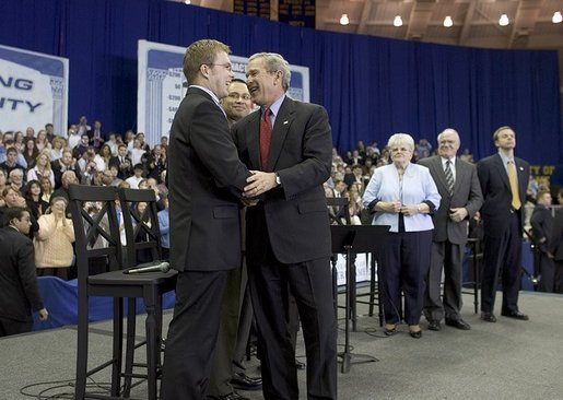 President George W. Bush greets Jon Paul Surma after a conversation on strengthening Social Security on the University of Notre Dame campus in South Bend, Indiana on Friday, March 4, 2005. White House photo by Paul Morse