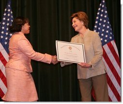 Laura Bush hands out awards at the Institute of Museum and Library Services (IMLS) ceremony, March 14, 2005 at the Hotel Washington in Washington, D.C.  White House photo by Susan Sterner