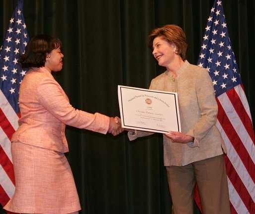 Laura Bush hands out awards at the Institute of Museum and Library Services (IMLS) ceremony, March 14, 2005 at the Hotel Washington in Washington, D.C. White House photo by Susan Sterner