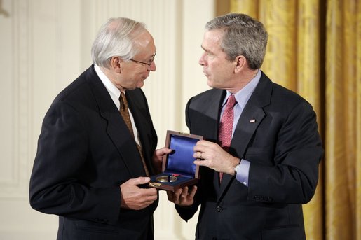 President George W. Bush presents the National Medals of Science and Technology during a ceremony in the East Room, Monday, March 14, 2005. White House photo by Paul Morse
