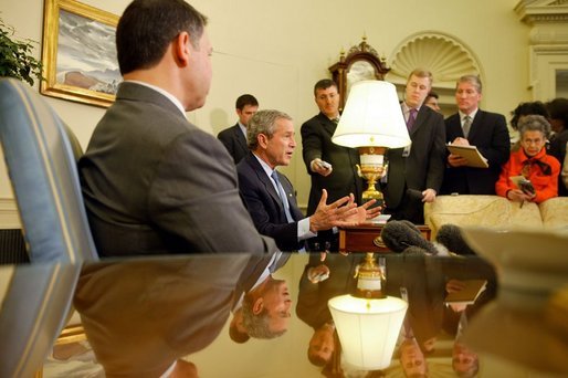 President George W. Bush and His Majesty King Abdullah of Jordan talk with reporters in the Oval Office Tuesday, March 15, 2004. White House photo by Paul Morse