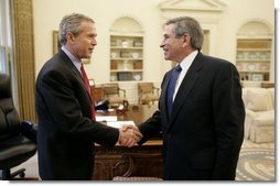 President George W. Bush welcomes Deputy Secretary of Defense Paul Wolfowitz to the Oval Office Wednesday, March 16, 2005. President Bush is recommending Secretary Wolfowitz to be elected as the next President of the World Bank.  White House photo by Paul Morse